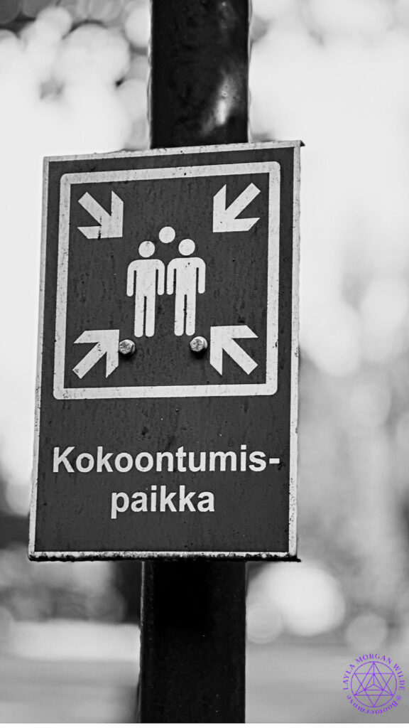 Graphic sign of a meeting place with two men in Finland