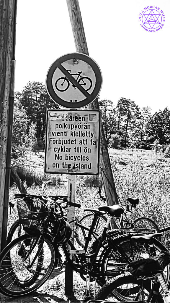 No bicycles sign in three languages